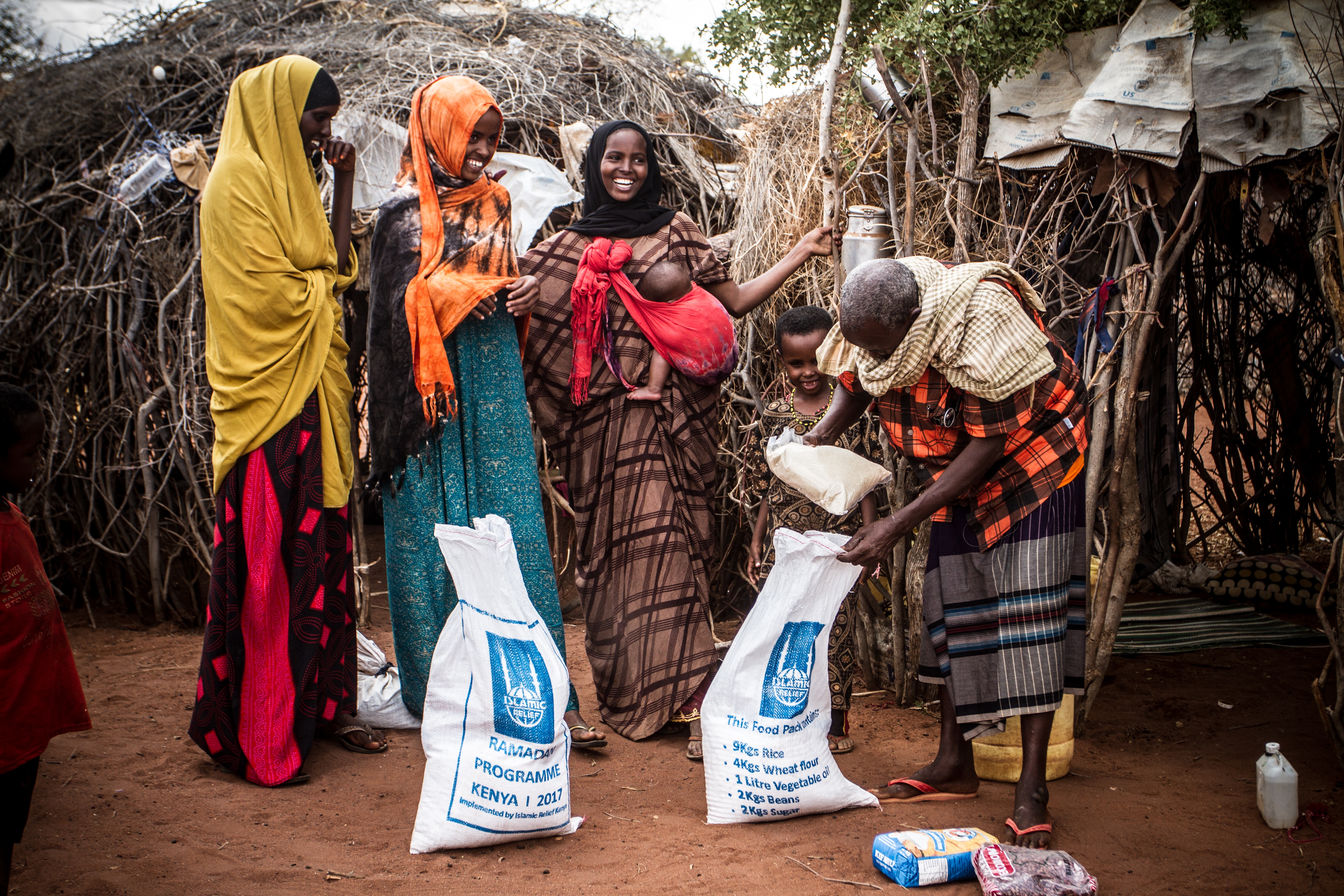 Islamic Relief Charity handing out Food Packages on the Ground in Africa